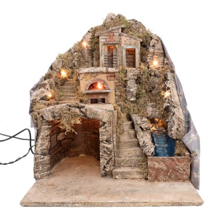 Illuminated nativity scene with electric oven and working stream