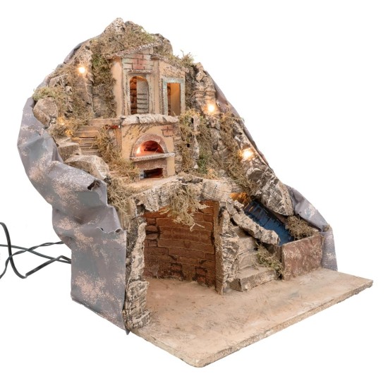 Presepe illuminato con forno e ruscello funzionante a corrente