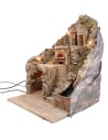 Illuminated nativity scene with electric oven and working stream