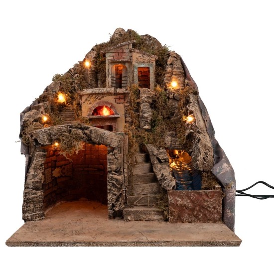 Illuminated nativity scene with oven and stream powered by