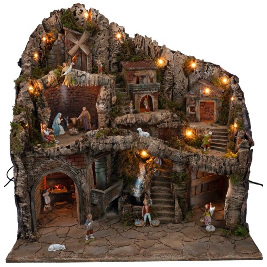 Illuminated nativity scene with statues, stream, oven, and windmill