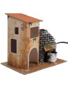 Casa con fuente funcionando cm 19x13,5x18 h.