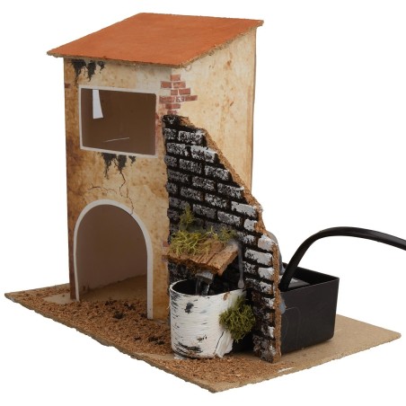 Casa con fuente funcionando cm 19x13,5x18 h.