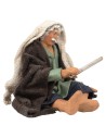 Seated man stoking the fire series 12 cm