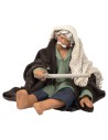 Seated man stoking the fire series 12 cm