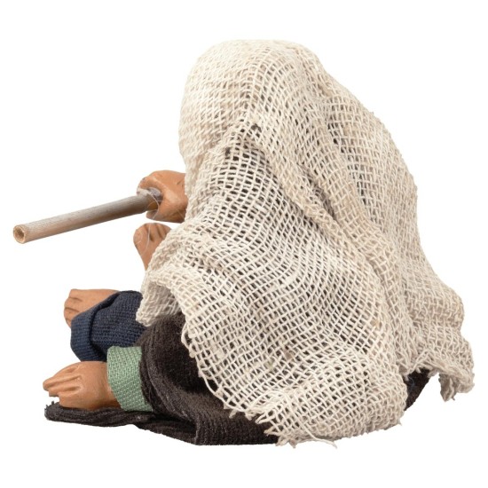 Hombre sentado avivando el fuego serie 12 cm para belén Mondo