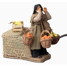 Seller with baskets of fruit series 10 cm in motion 2