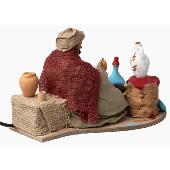 Pittore seduto in movimento serie 30 cm per presepe Mondo