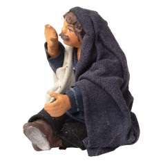 Vendedor sentado que llama con la mano a la boca serie 10 cm 2