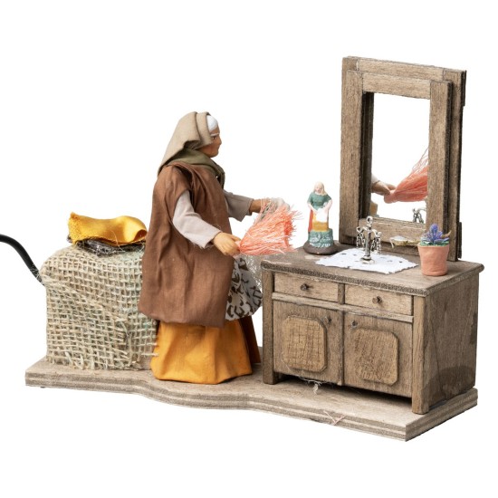 Woman dusting the cupboard in motion series 12 cm for