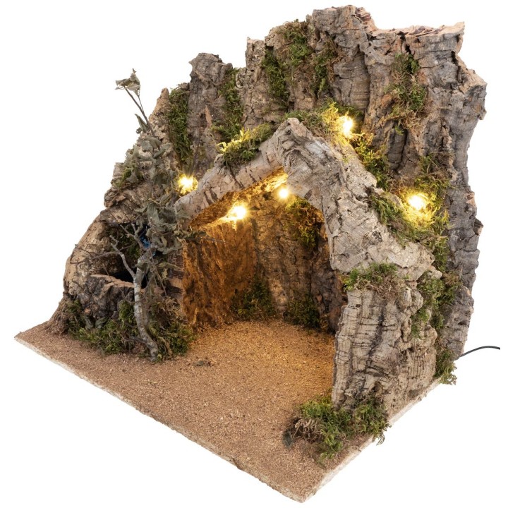 Illuminated nativity scene with cork bark stable and