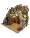 Illuminated nativity scene with cork bark stable and