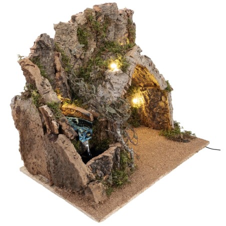 Illuminated nativity scene with cork bark stable and
