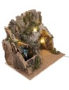 Illuminated nativity scene with stable made of cork bark and