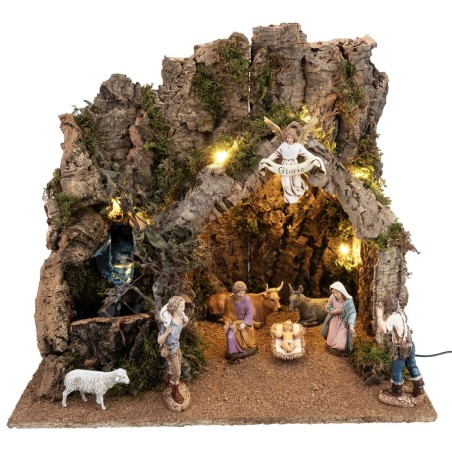 Illuminated nativity scene with cork bark stable and