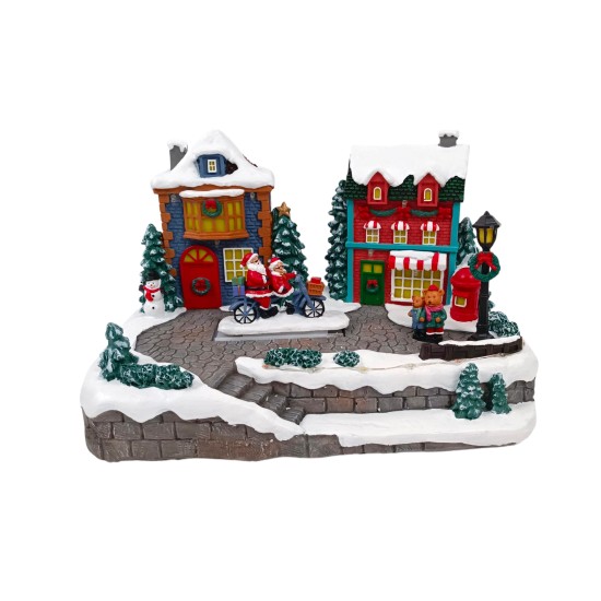 Christmas setting in motion complete with light and music