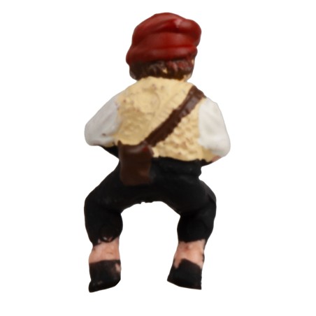 Bambino in posizione seduta serie 7-8 cm per presepe Mondo