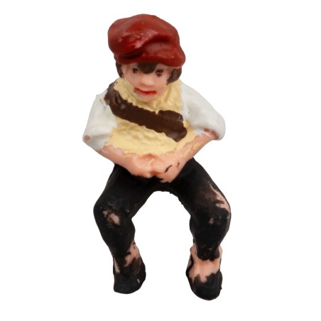Bambino in posizione seduta serie 7-8 cm per presepe Mondo