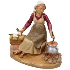 Donna seduta che cucina serie 12 cm Fontanini
