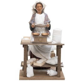 Donna che setaccia serie 30 cm in movimento