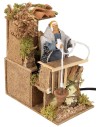 Woman on the balcony with basket 10 cm in motion