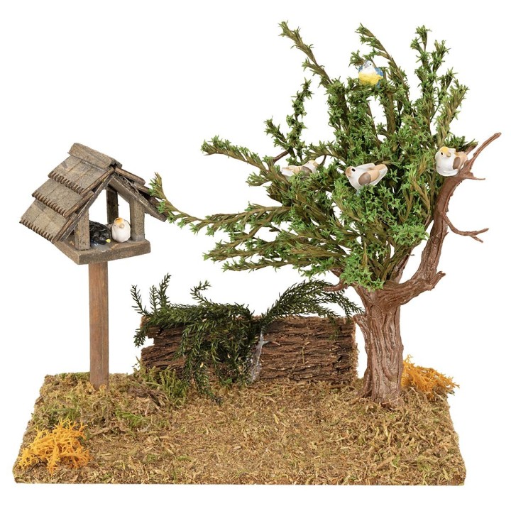 Meadow with small house and tree with birds