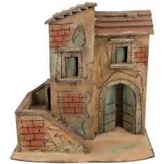 Casa napolitana con escalera lateral y arco de