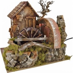Casa con molino de agua en funcionamiento de