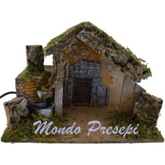 Hut with the fountain running cm 36x17x23 h.