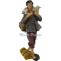 30 Cm Shepherd with sheep on shoulders in resin