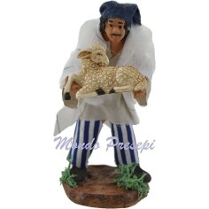 Man with sheep in arm cm 10