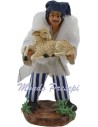 Man with sheep in arm cm 10
