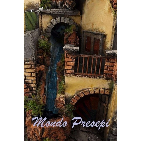 The crib with the village lit up with a waterfall, 60x40