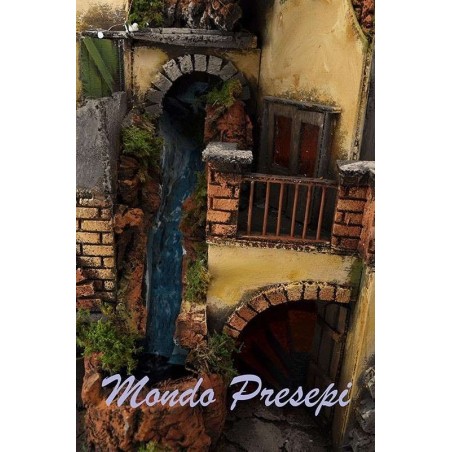 The crib with the village lit up with a waterfall, 60x40