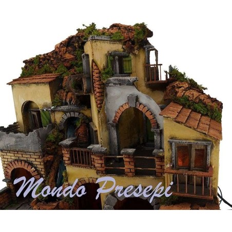 The crib with the village lit up with a waterfall, 60x40