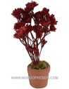 Vaso con flores rojas