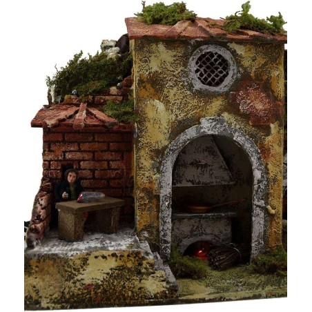 Hombre en la mesa en movimiento con fuego, fuente y luces Mundo