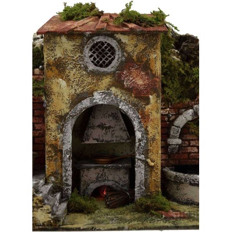 Uomo al tavolo in movimento con fuoco, fontana e luci Mondo