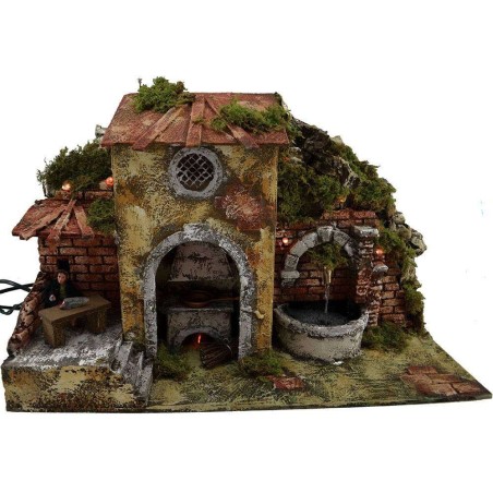 Uomo al tavolo in movimento con fuoco, fontana e luci Mondo