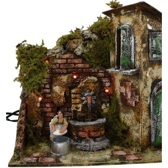 Lavandaia in movimento alla fontana Mondo Presepi