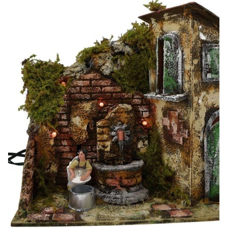 Lavandaia in movimento alla fontana Mondo Presepi